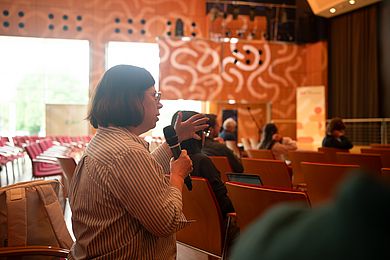 keynote speaker in audience  2 