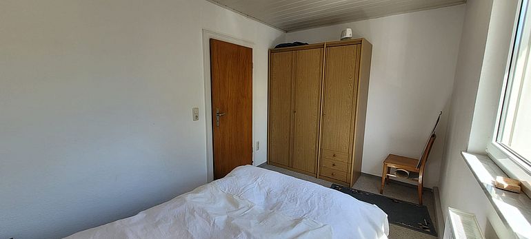 Schlafzimmer .