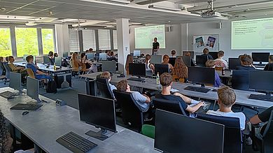 Besucher im Hörsaal