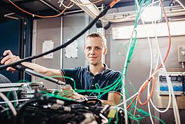 Student working on one of the engine test benches