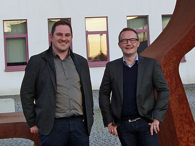 Professor Dr. med. Stefan M. Sesselmann (MHBA) mit dem Referenten Dr.-Ing. Rainer Detsch